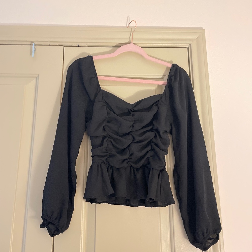 Black long sleeved ruched blouse